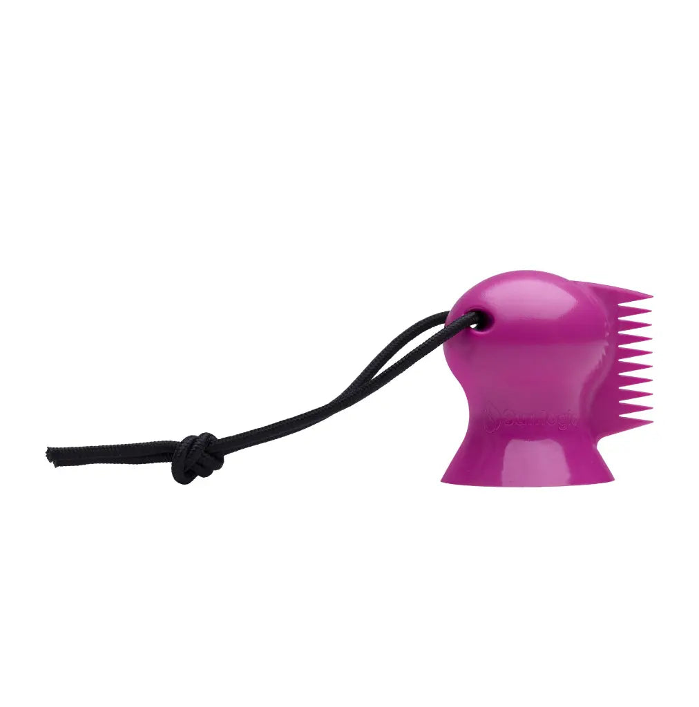 Peine rascador de parafina para tabla de surf Surflogic Dino Wax en color rosa